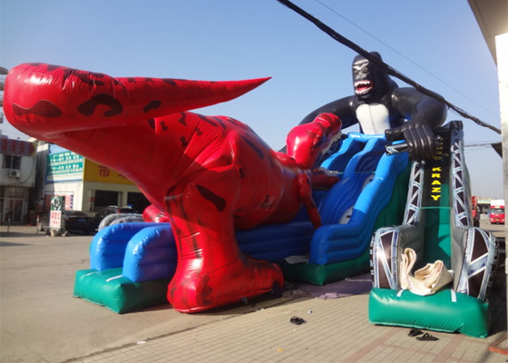 China Dianosaur grande y tobogán acuático inflable comercial de King Kong para el parque de atracciones distribuidor